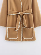 The Beige Agenda Belted Coat